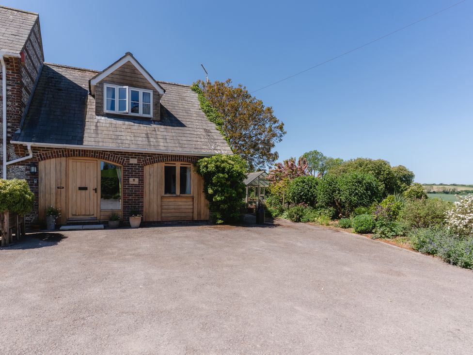 A house with garden and driveway at Tokenhill Cottage Piddletrenthide