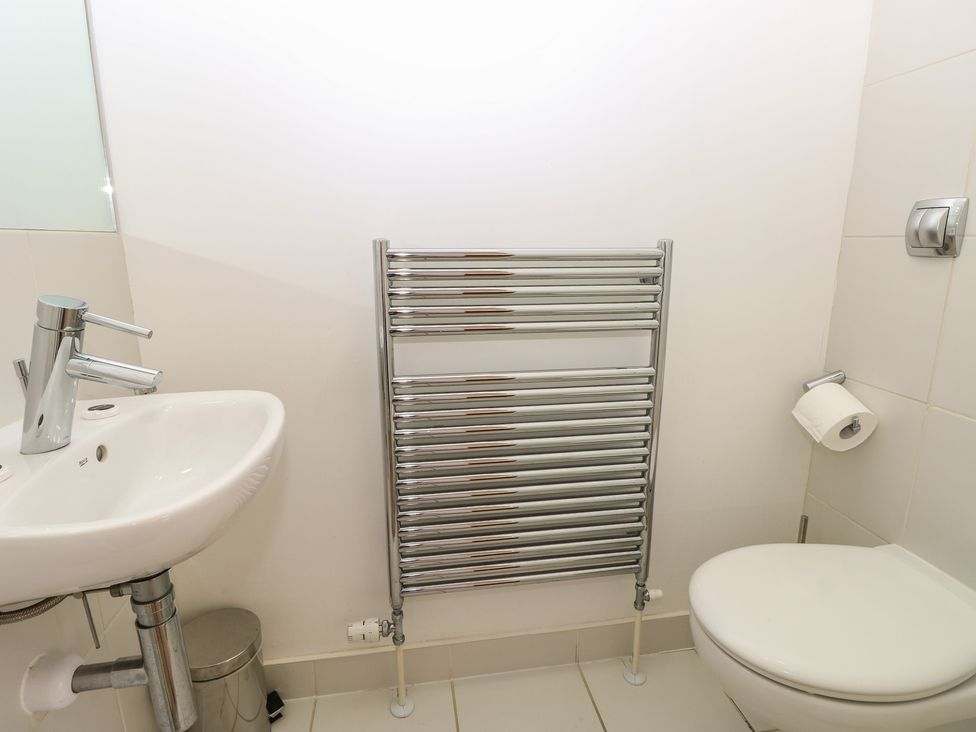 A bathroom with a sink and toilet at Delaware M2 in Yarmouth