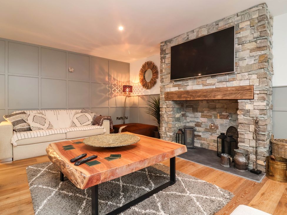A living room with a sofa and a coffee table at The Granary in Barnstaple