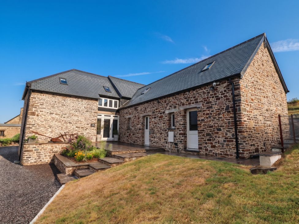 An outdoor view of a stone building at The Granary in Barnstaple