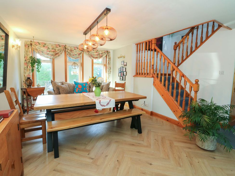 A dining room with a table and chairs at Ninevah, Balquhidder, Perthshire, Scotland