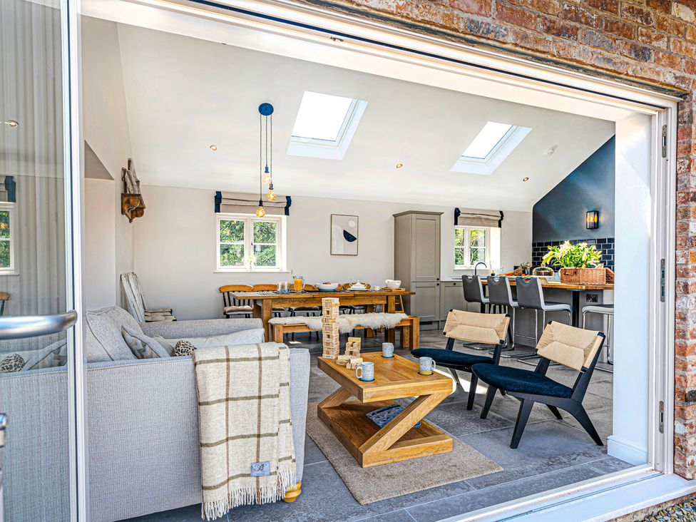 A dining room with a table and chairs at Fairvale House