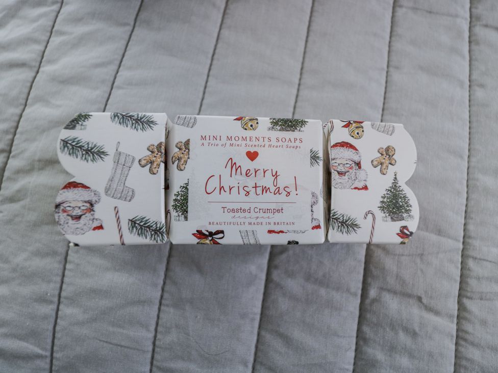 A trio of Christmas scented soaps in a decorative box at The Old Byre in Woodfalls