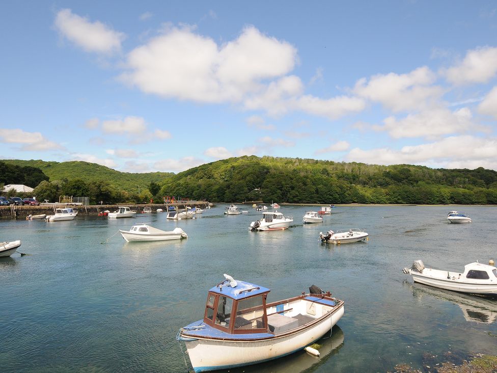 A harbor with boats on water at 3 River View in Looe