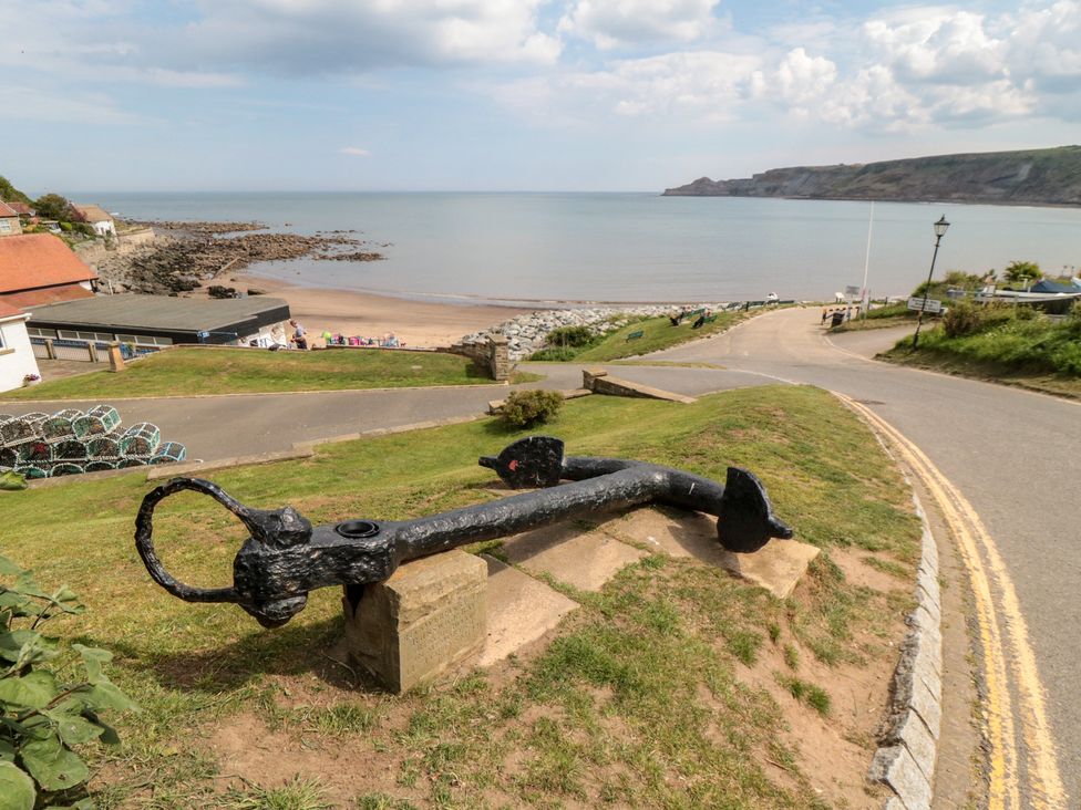 An anchor on a hill overlooking the sea at Tulip Lodge Runswick Bay near Staithes