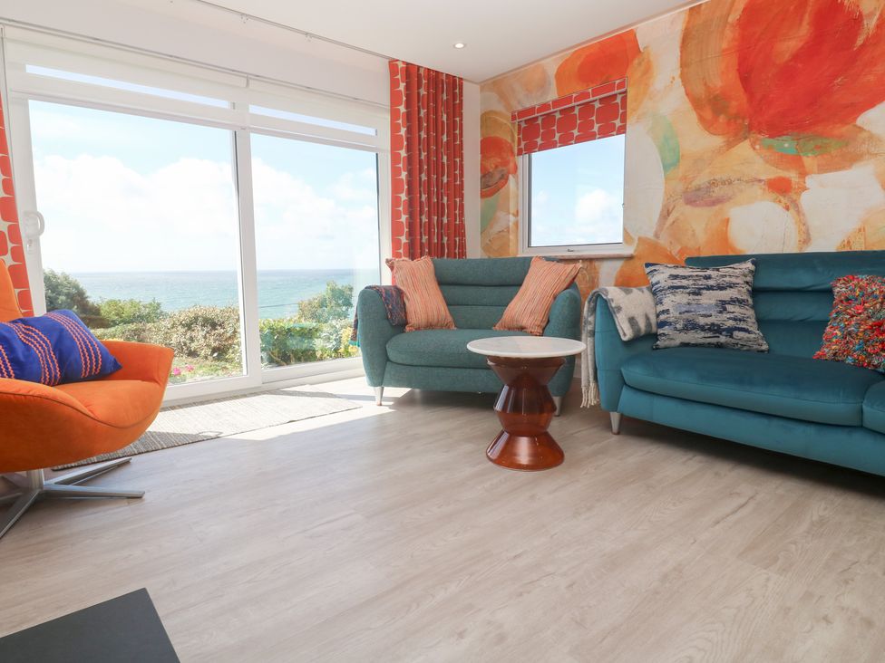 A living room with a view of the sea at Shearwater