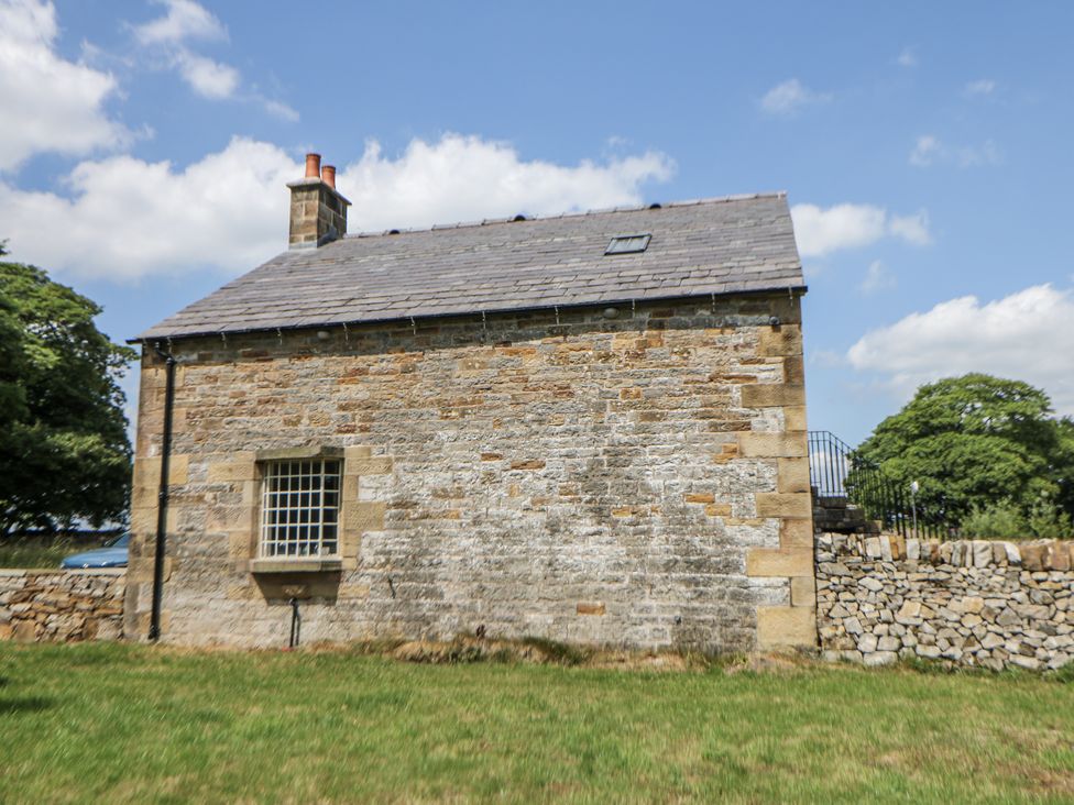 An exterior view of a stone building at The Coach House at Mayfurlong Farm Grindon near Waterhouses