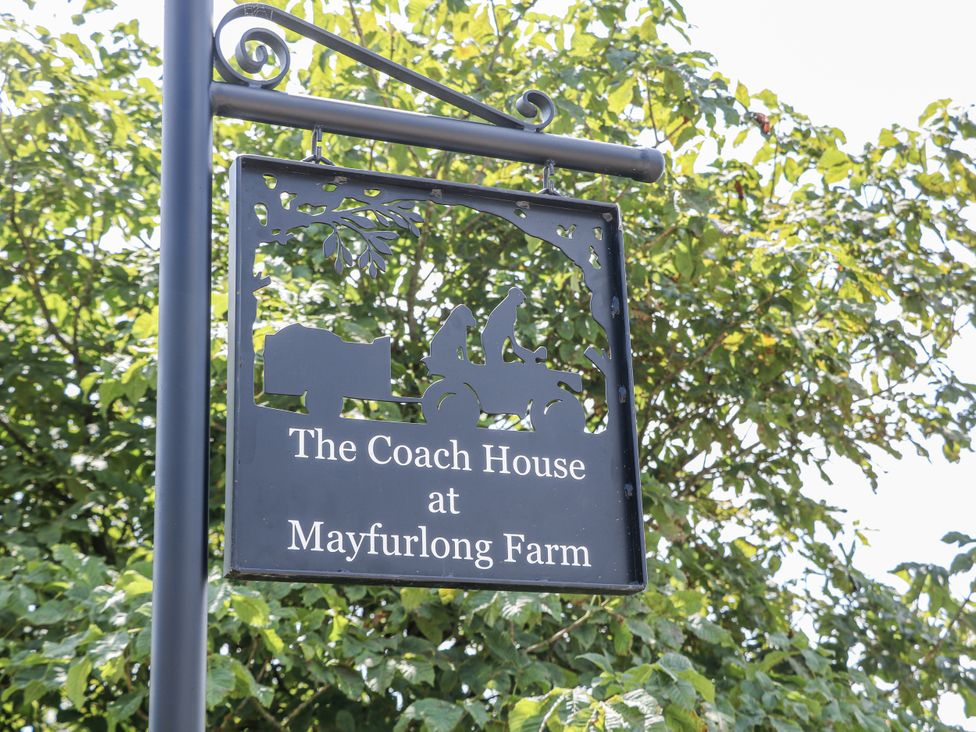 A sign for The Coach House at Mayfurlong Farm in Grindon near Waterhouses
