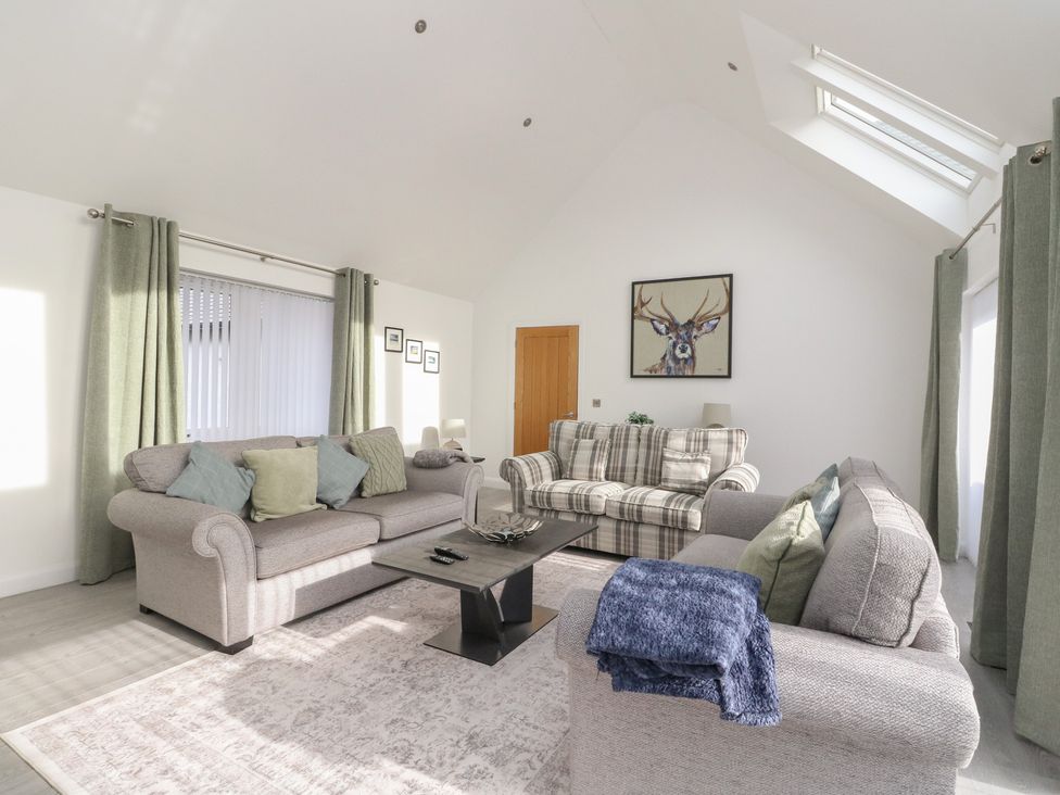 A living room with sofas and a coffee table at Eildan in Fort William