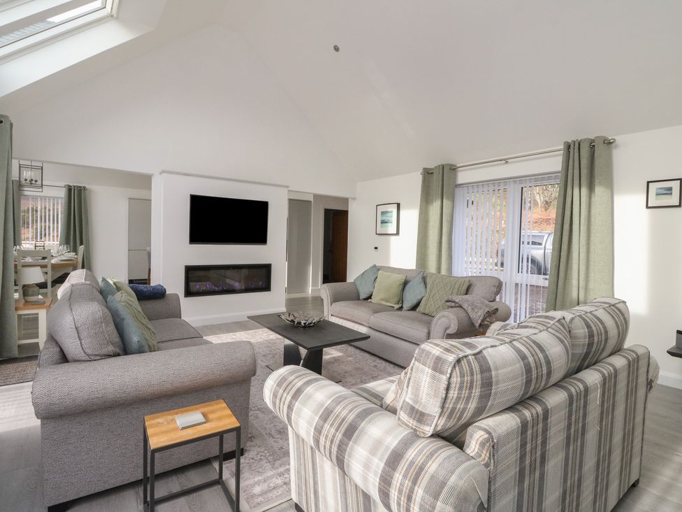 A living room with sofas and a coffee table at Eildan in Fort William