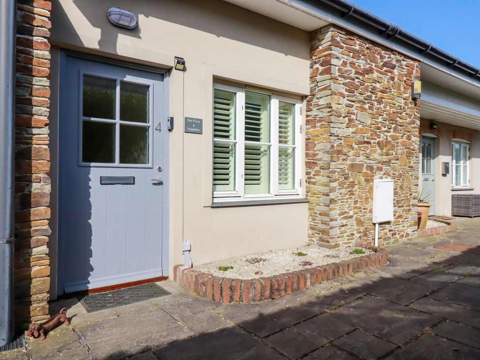An entrance with a door and window at Pen-Y-Les in Wadebridge