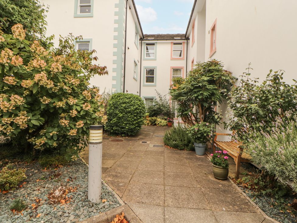 An outdoor area with pathways and plants at Flat 17 in Keswick