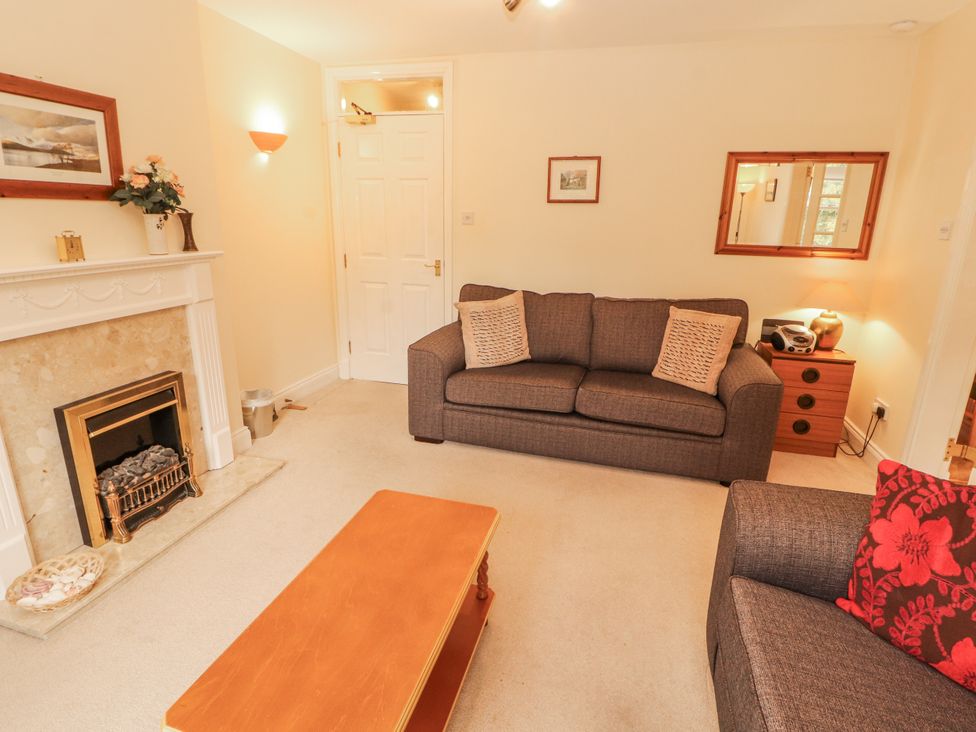 A living room with sofa and coffee table at Flat 17 in Keswick