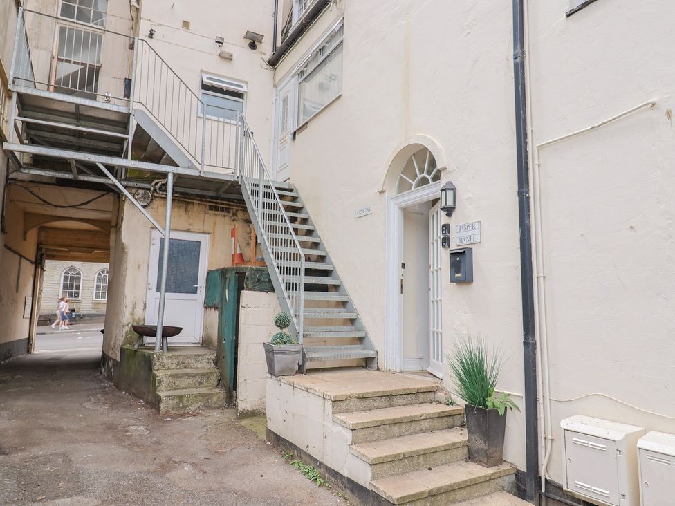 An outdoor area with stairs and door at Jasper in Lyme Regis