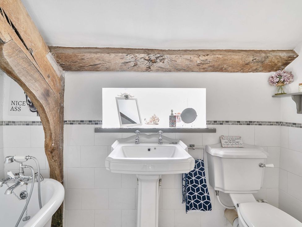 A bathroom with a sink and toilet at 2 Pigsfoot Cottages Ash Thomas near Halberton, Devon