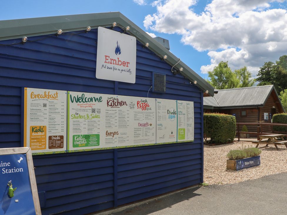 A menu board outside a restaurant with a bike hire sign at 18 Deer Glade in Landford