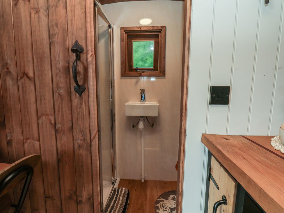 A bathroom with a shower and sink at Lodge Farm in Whitby