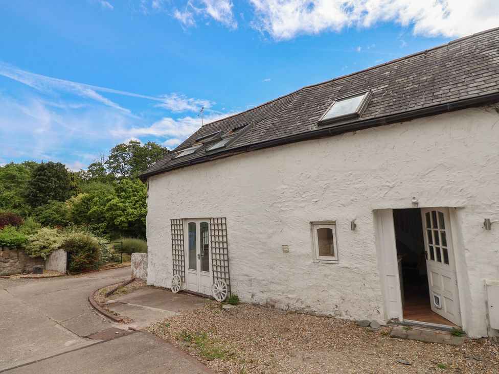 A building with windows and doors at The Studio Cottage in Denbigh