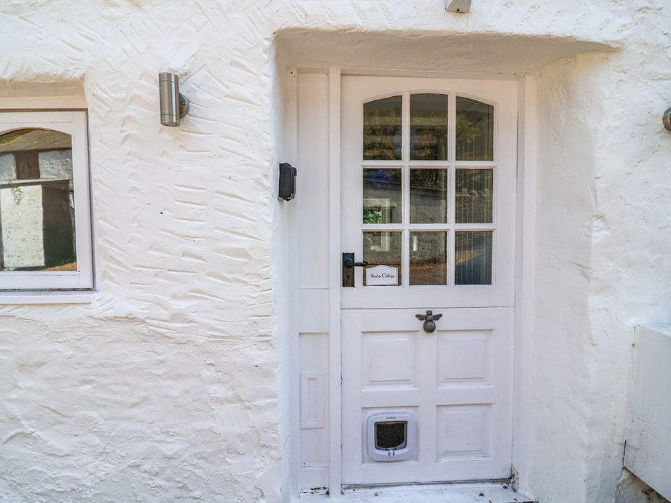 An entrance door and window at The Studio Cottage near Denbigh