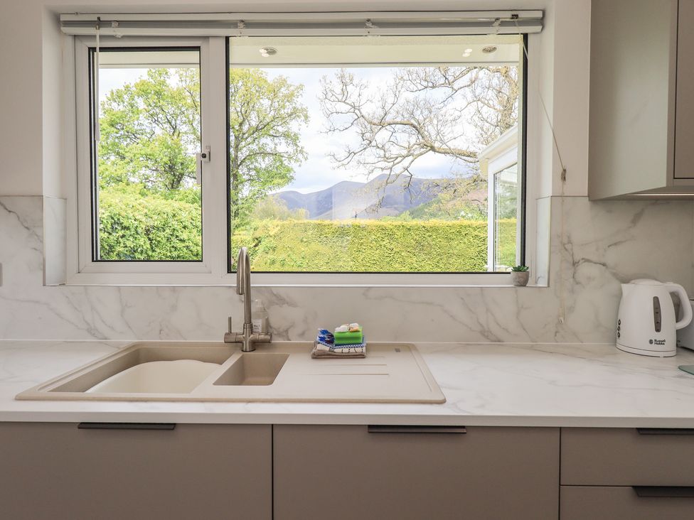 A kitchen sink and window view at Oaklea in Keswick