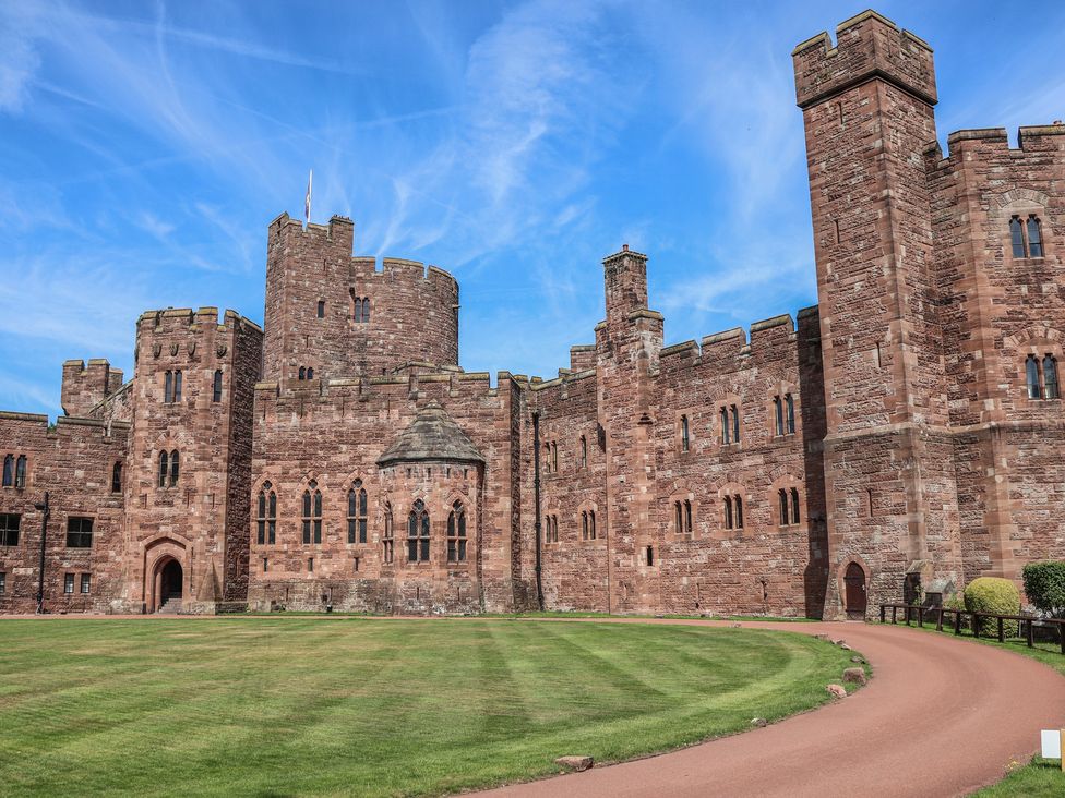 A castle with towers and walls at 1 Fountain Cottages Peckforton Tarporley