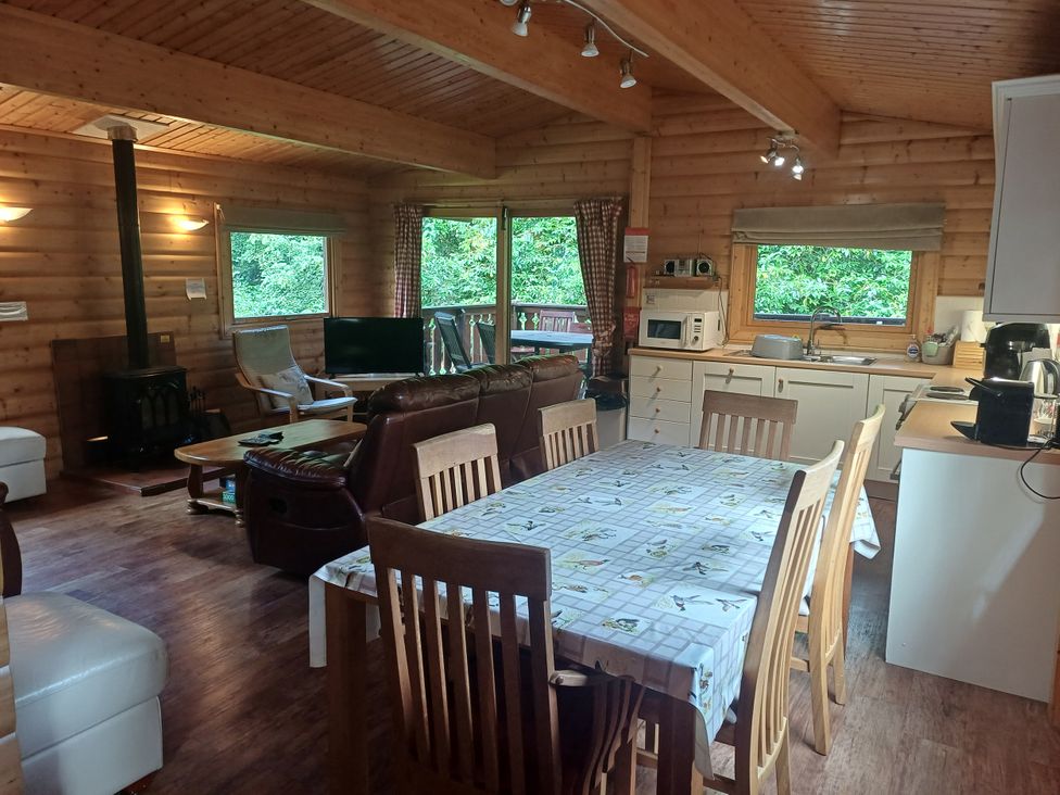 A living room with a table and chairs at 64 Acorn Lodge Kenwick Park Louth