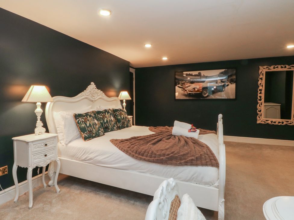 A bedroom with a bed and bedside table at Alexander in Cabus near Garstang