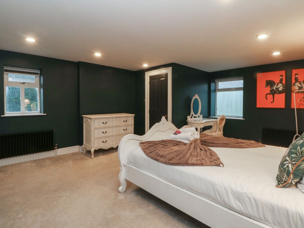 A bedroom with a bed and a dresser at Alexander in Cabus near Garstang