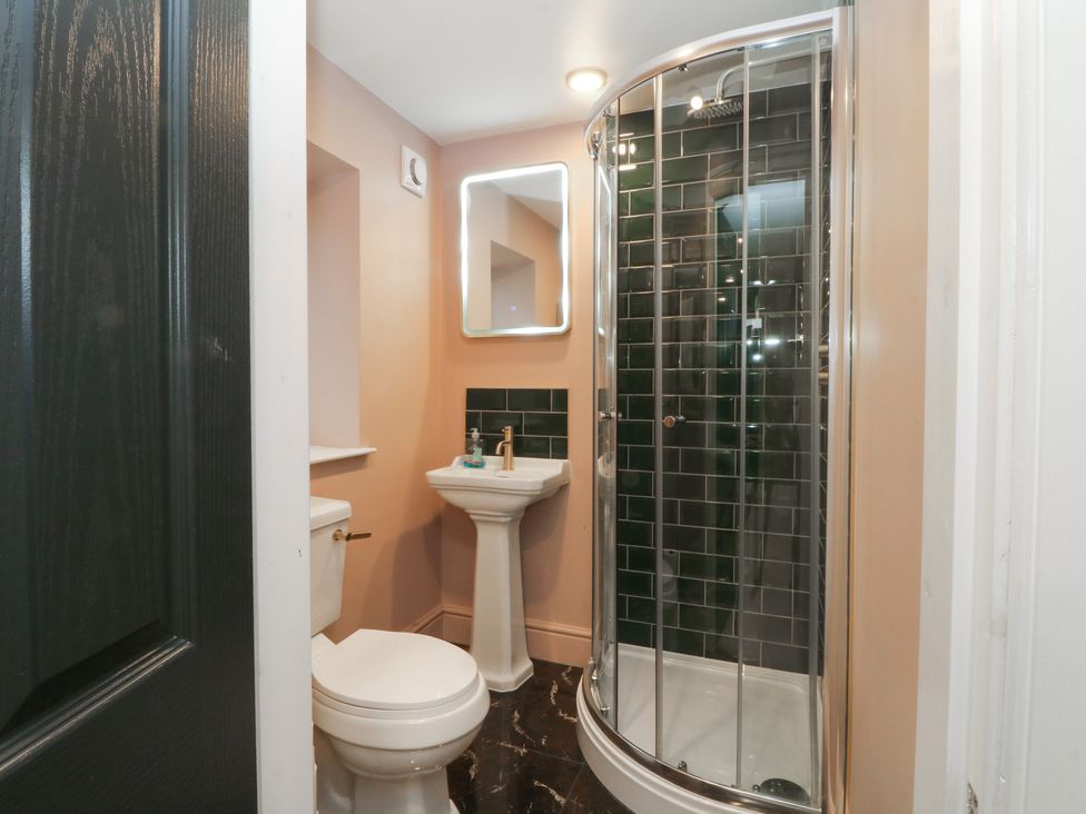 A bathroom with a sink and shower at Alexander in Cabus near Garstang