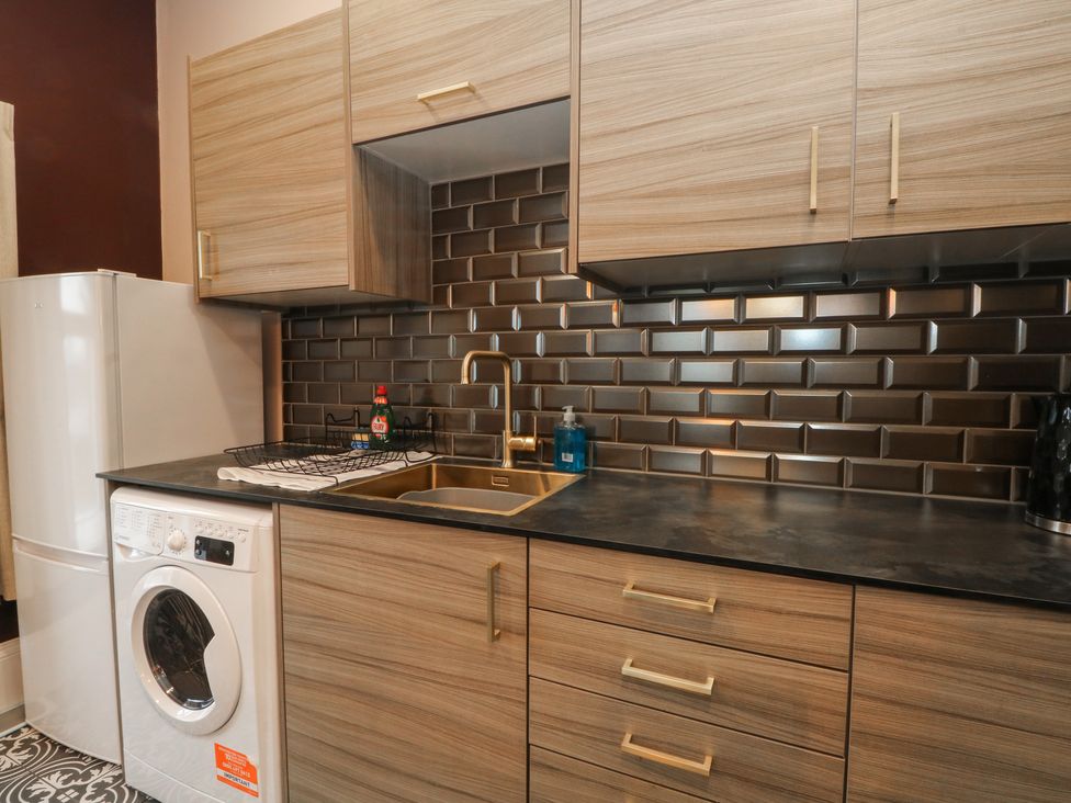 A kitchen with appliances and cabinetry at The Hyde Cabus near Garstang