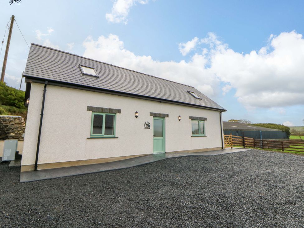 A house with a door and windows at Y Beudy near Llanilar