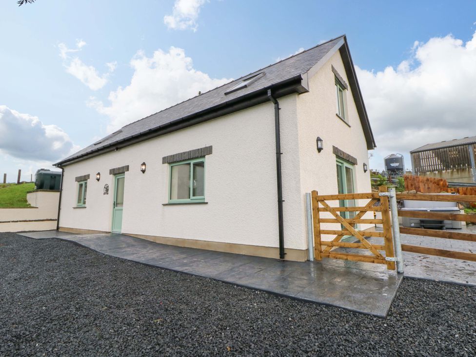 A house with a pathway and gate at Y Beudy near Llanilar