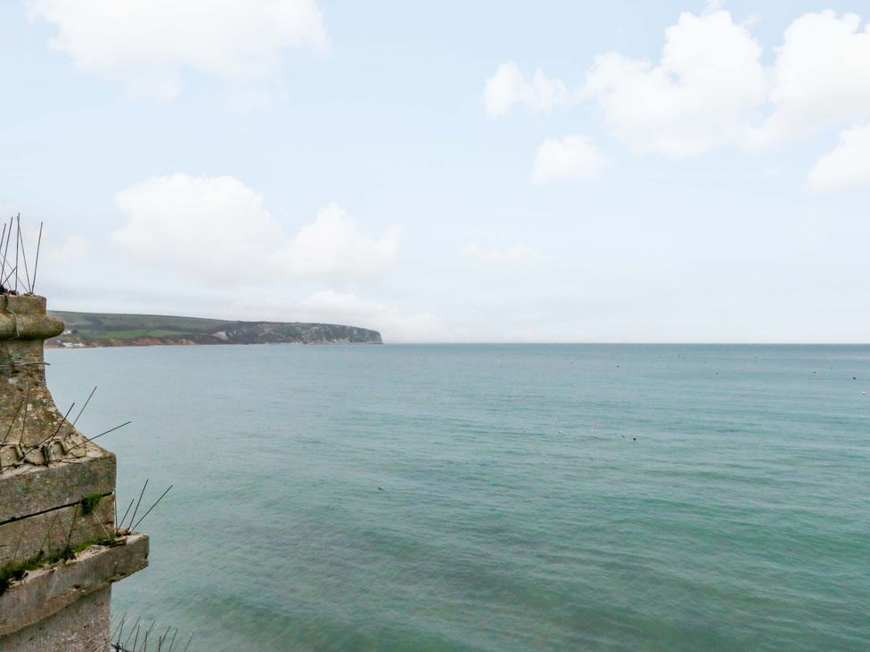 A view of the ocean and cliffs at Bay View in Swanage
