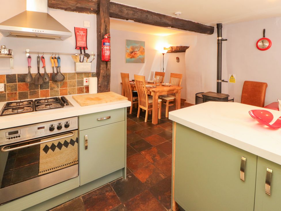 A kitchen with a dining area at Beck Edge in Braithwaite