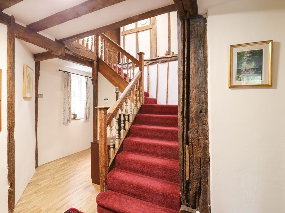 A staircase in a hallway at Chilton Manor House in Sittingbourne