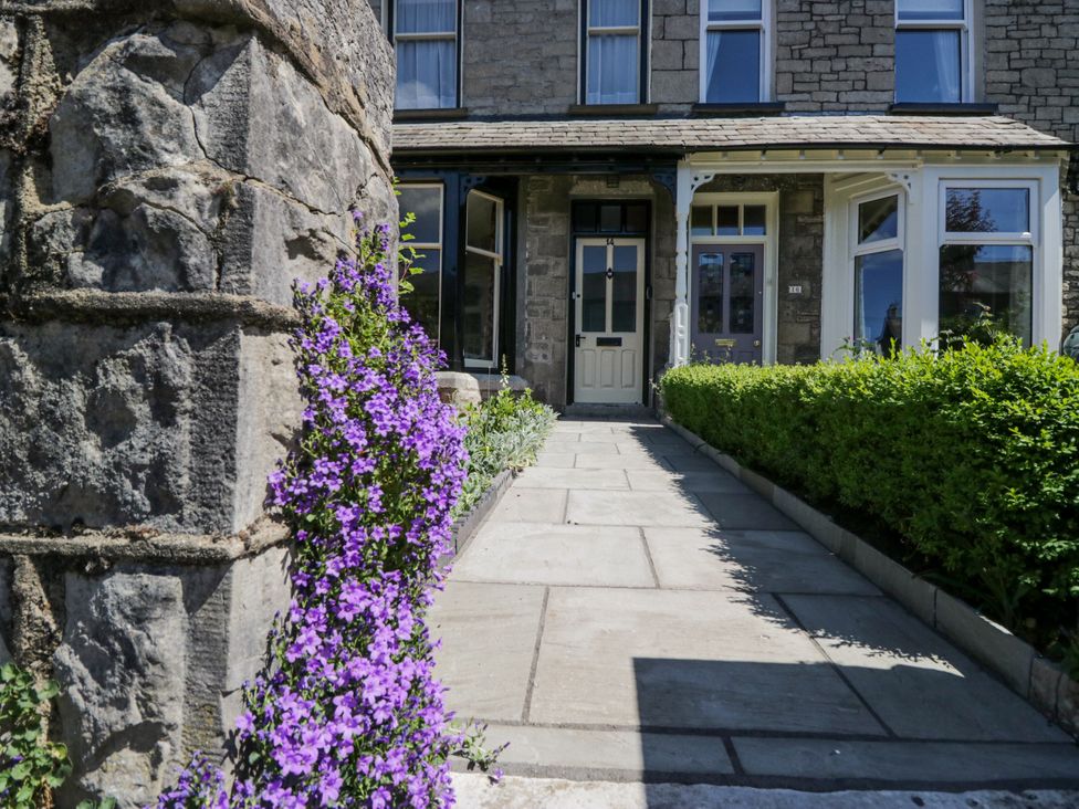 A pathway leading to the entrance of a house at 14 Castle Garth Kendal