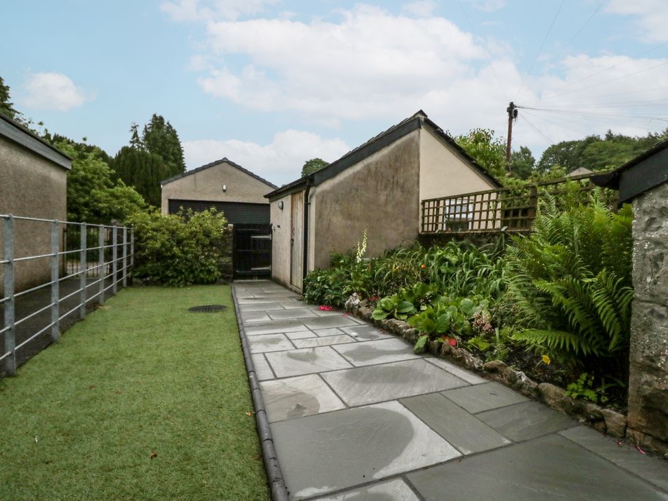 A pathway along a garden area at 14 Castle Garth Kendal