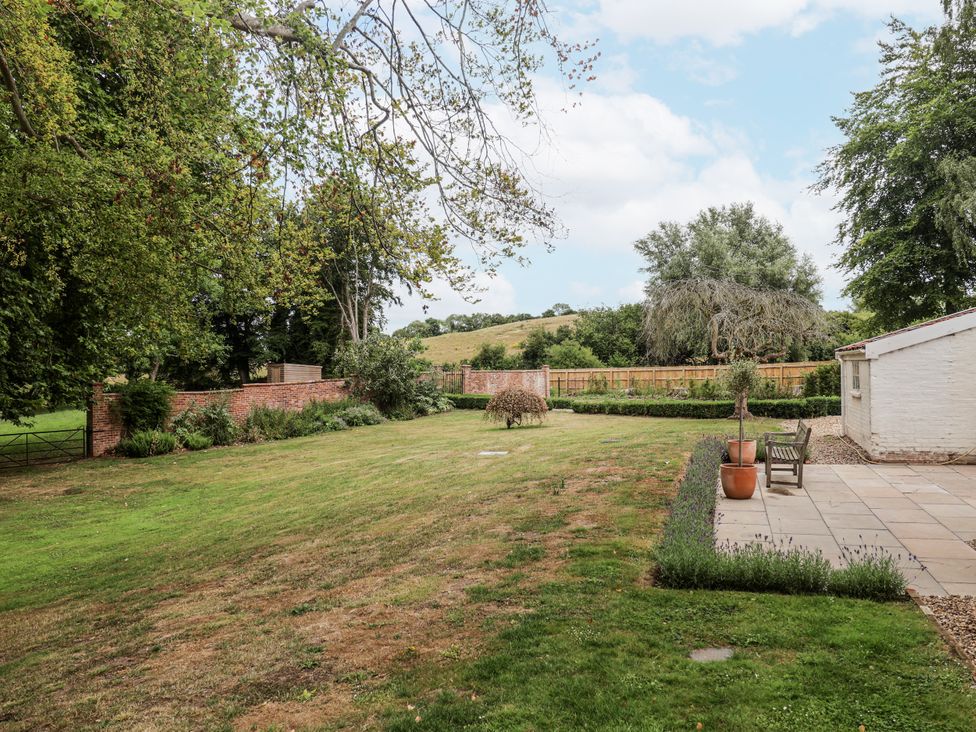A garden area with grass and trees at Syleham House Syleham near Eye