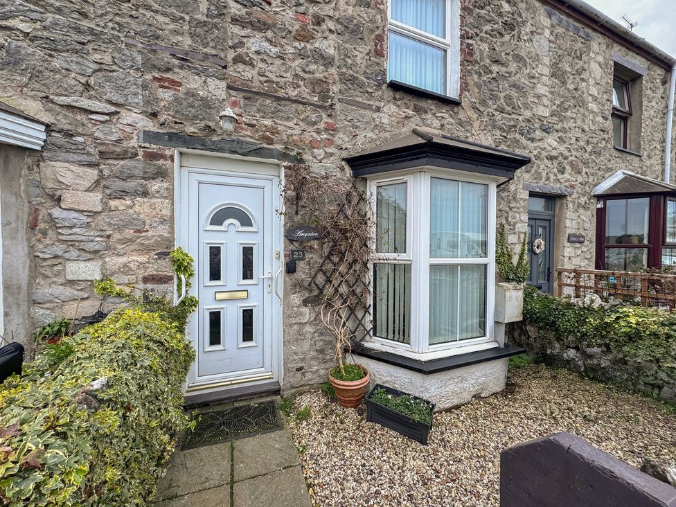 An entrance with a door and window at 23 Beach Road in Y Felinheli