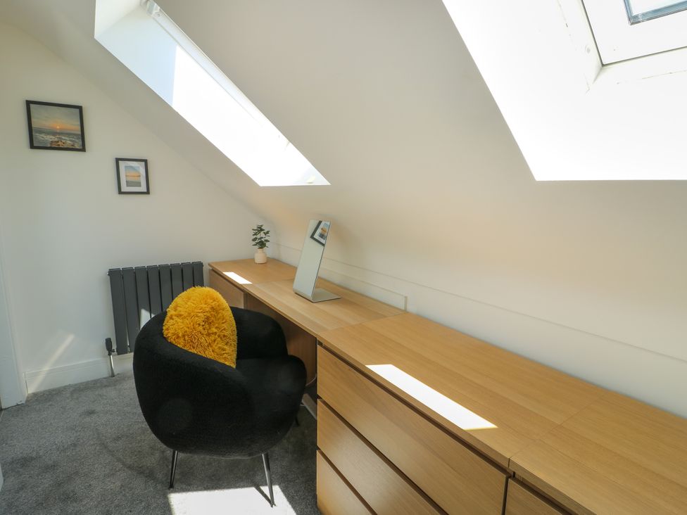 An office with a desk and chair at Iscoed Rhosneigr