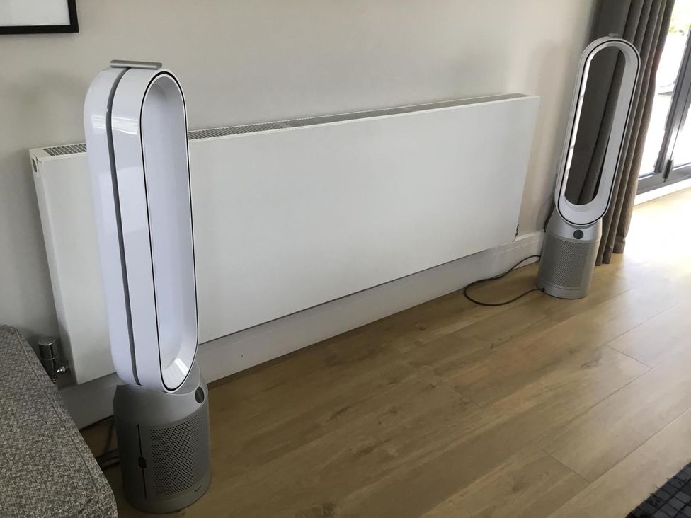 Two fans and a heating unit in a living room at Yonder Lea in Bowness-On-Windermere