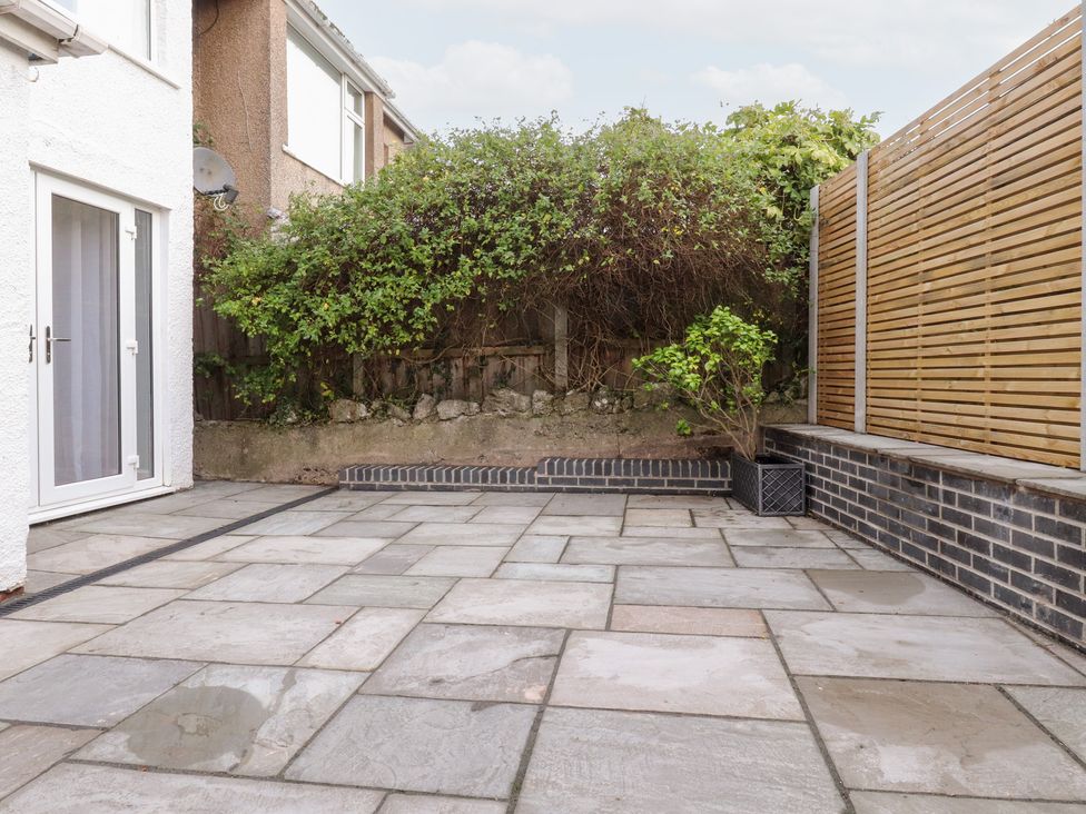 A garden with paving stones and a bush at 480 Marine Road East Morecambe