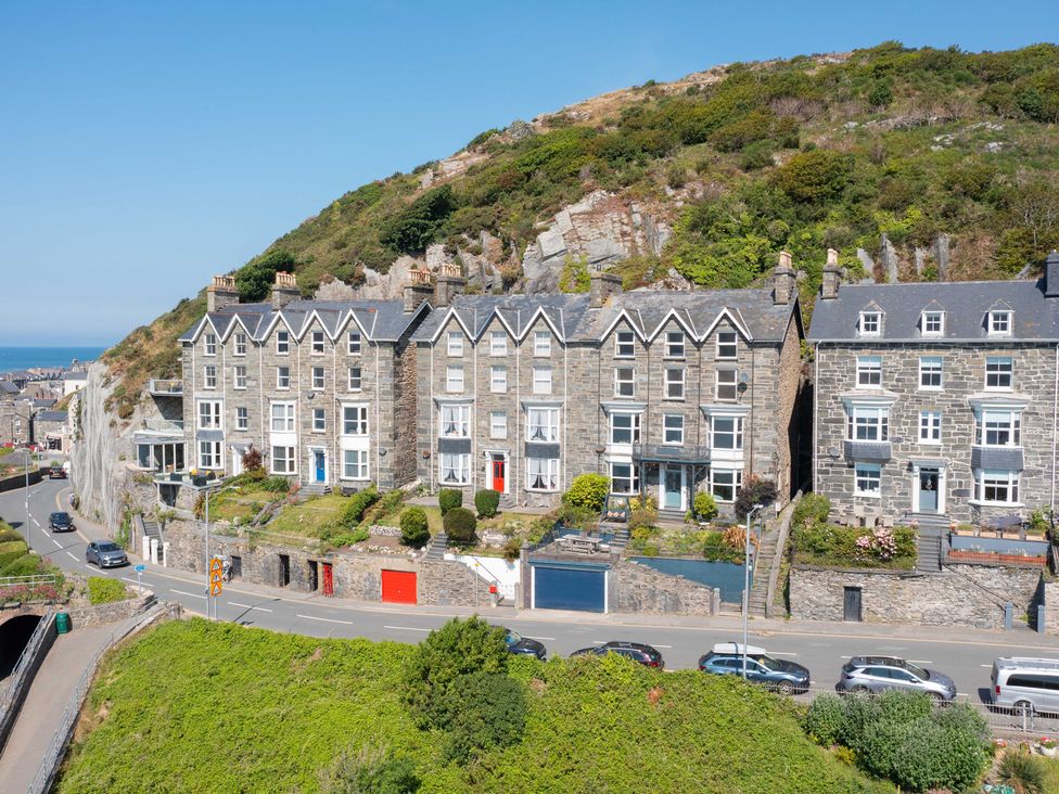 A row of stone houses alongside a road at Bod Idris Barmouth