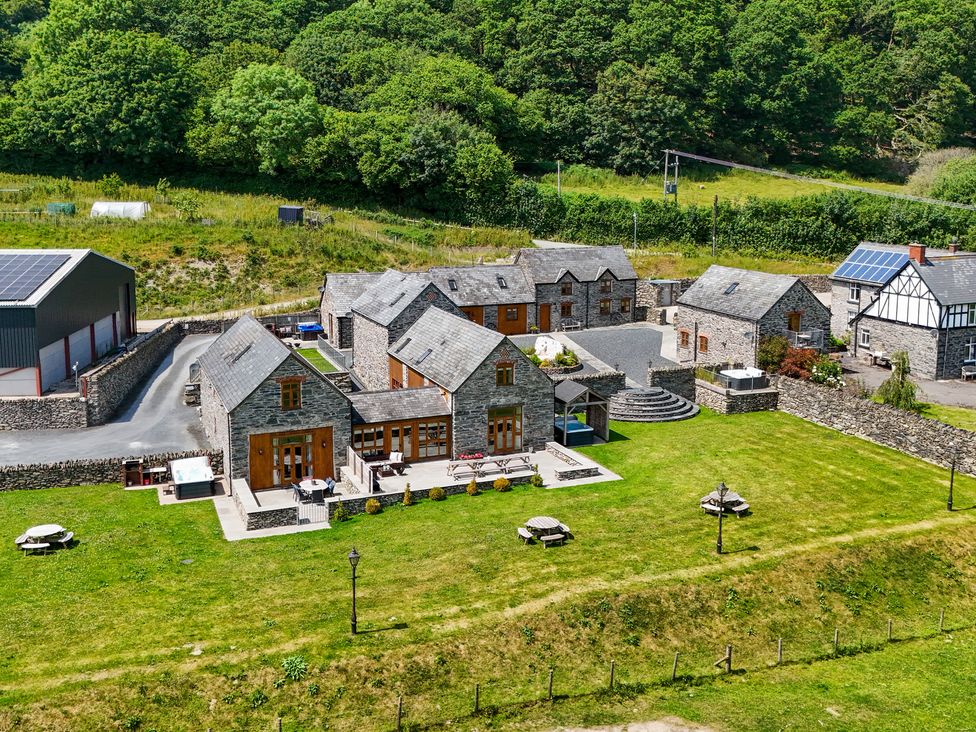 A group of houses with garden space and parking area at Hay Store in Corwen
