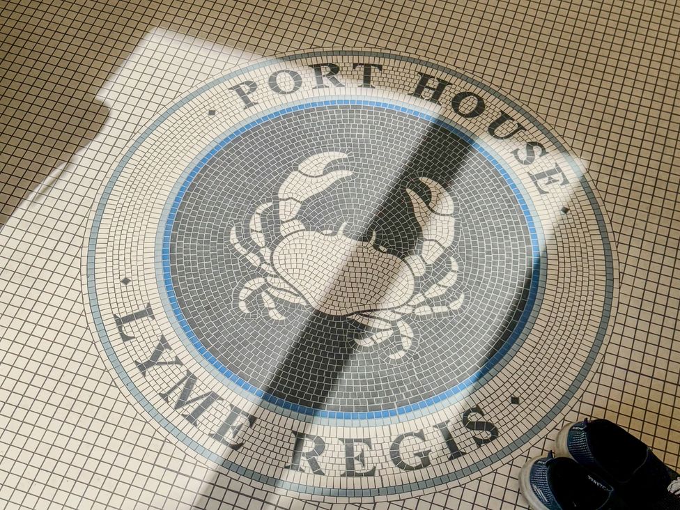 A mosaic flooring with crab design at Port House in Lyme Regis
