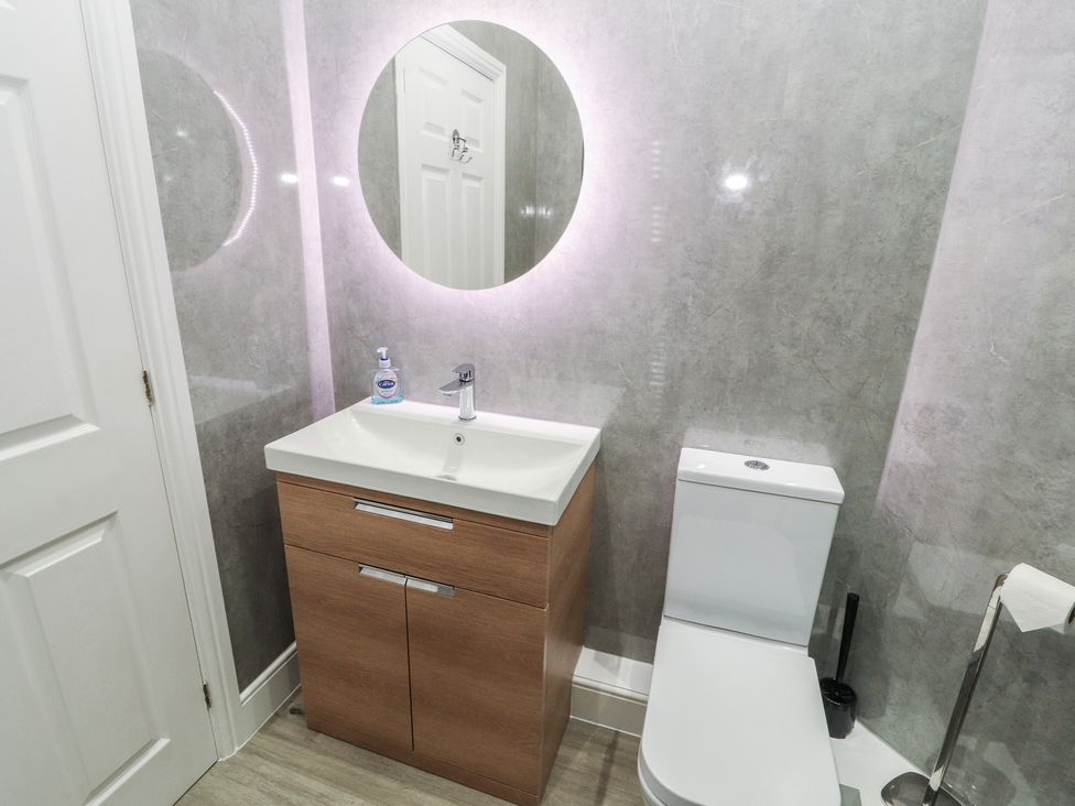 A bathroom with a sink and toilet at Silver How in Ambleside
