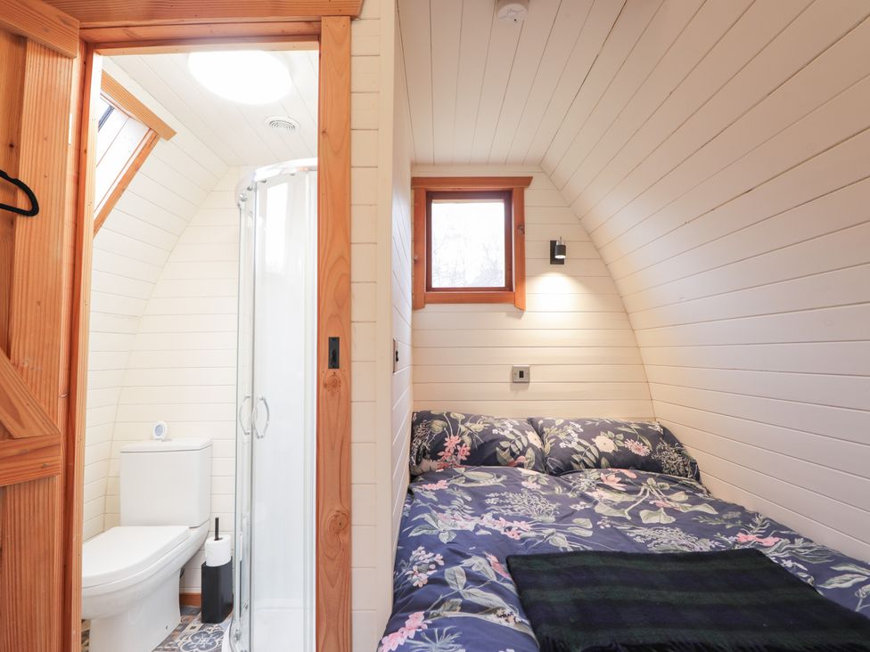 A bathroom with a shower and toilet at Pod 2 in Beauly