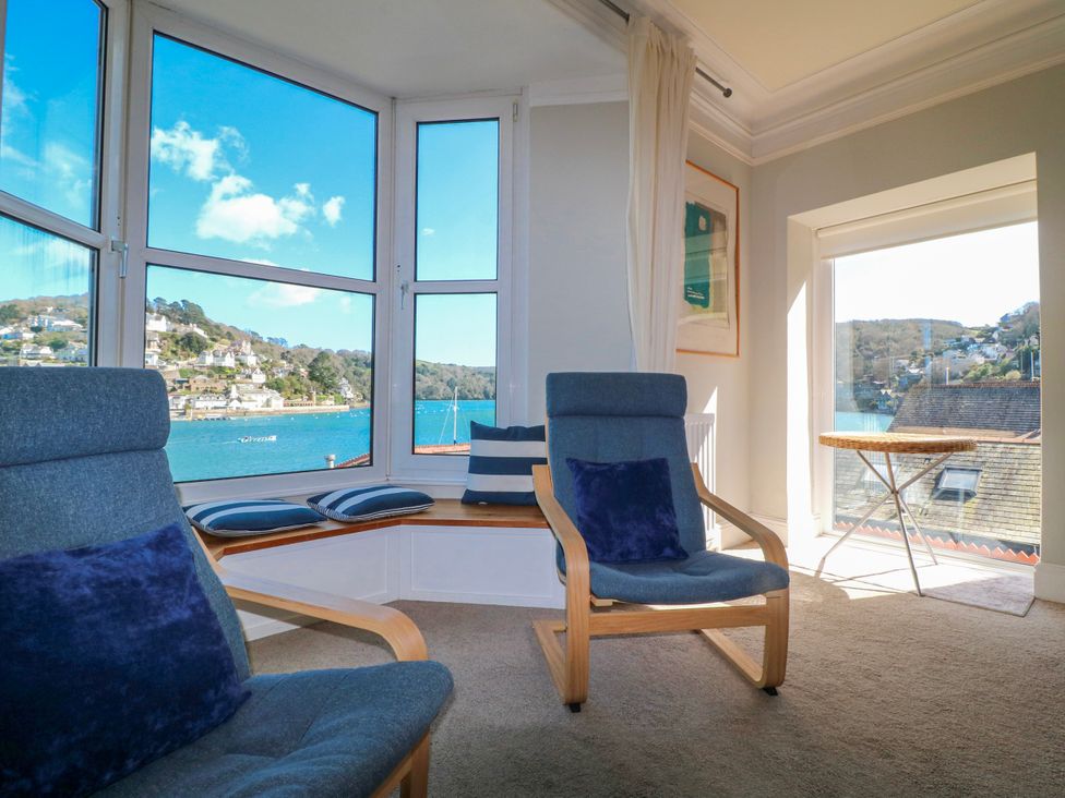 A living room with chairs and a table at Harbourside in Dartmouth