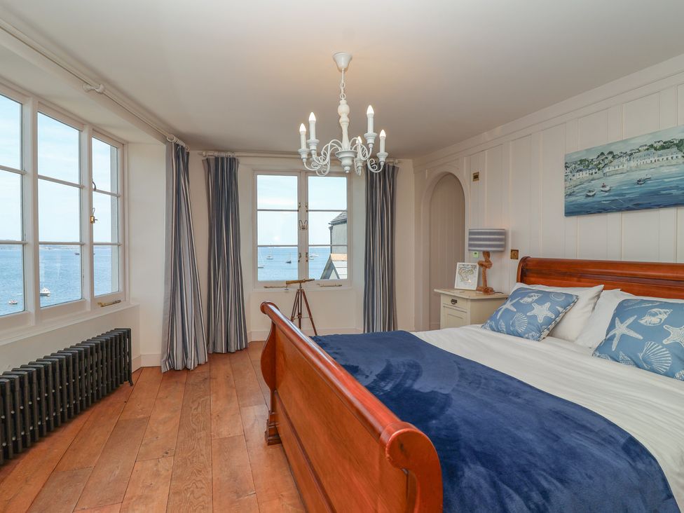 A bedroom with a bed and window at Marina in 