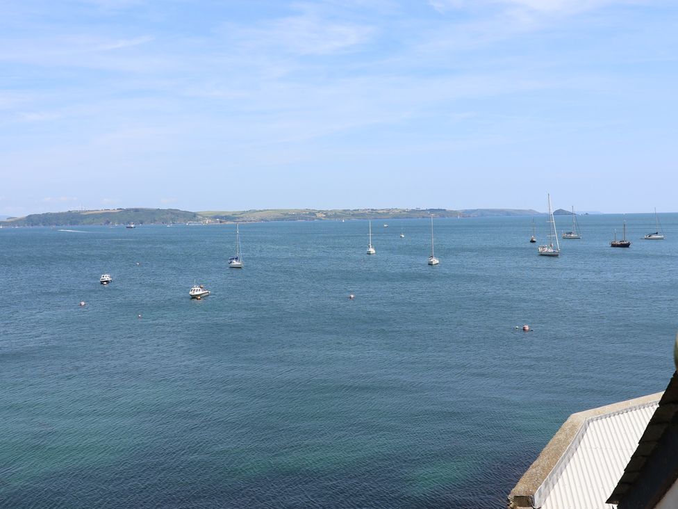A view of boats on the water under a clear sky at Marina 
